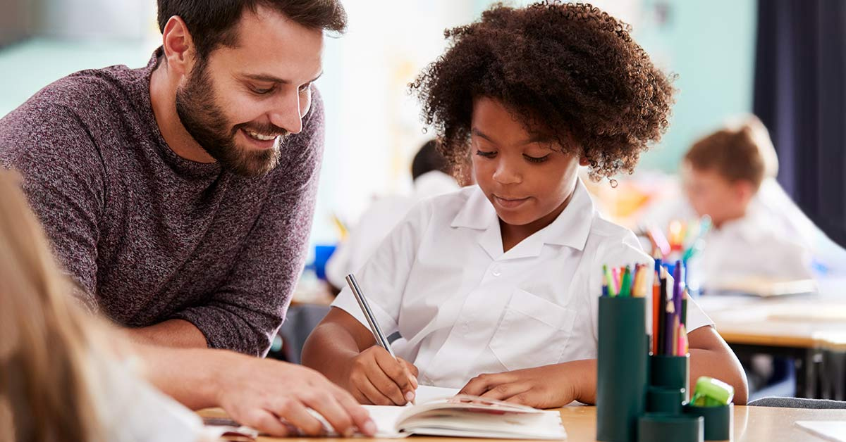 Adult helping child with science project