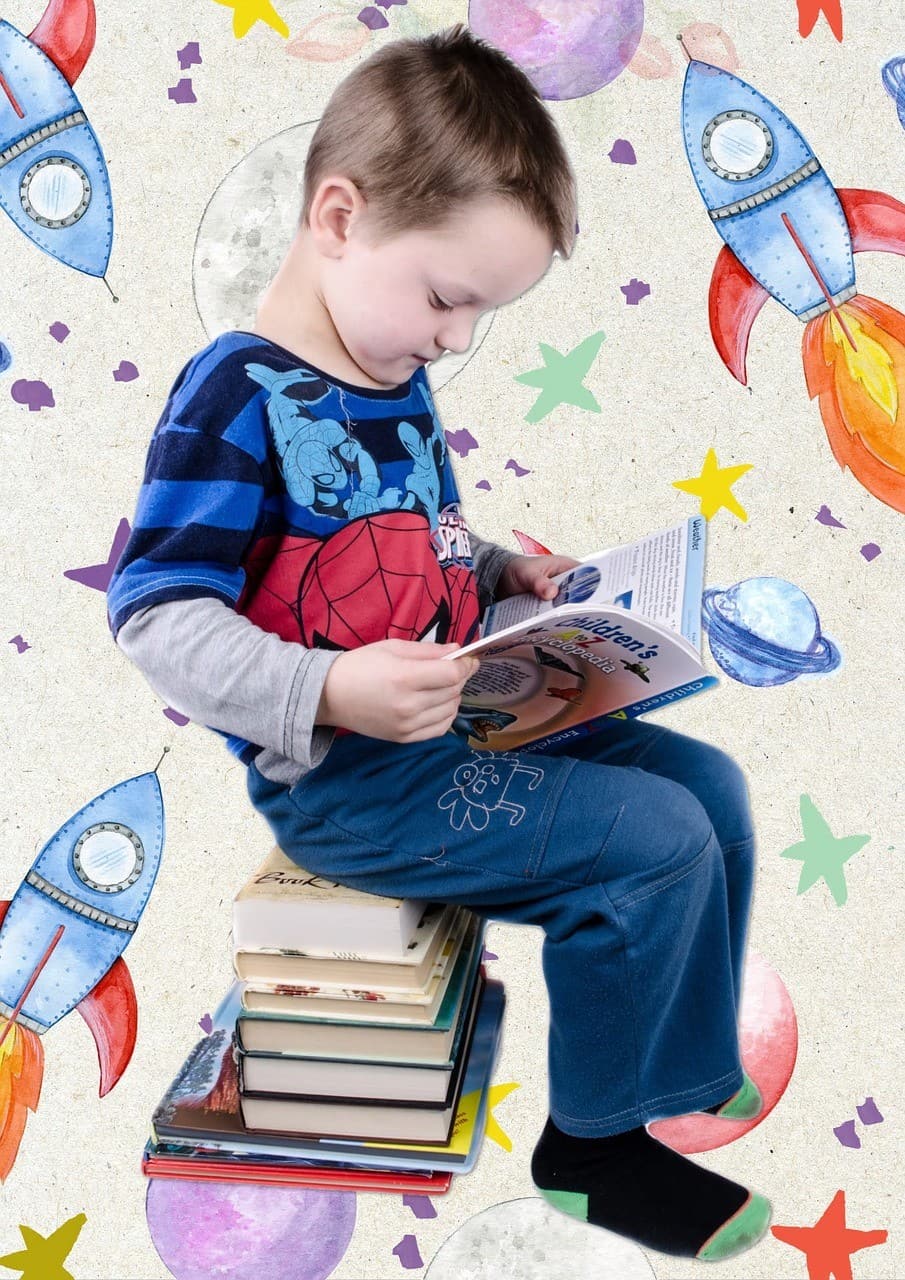 Child reading a science book