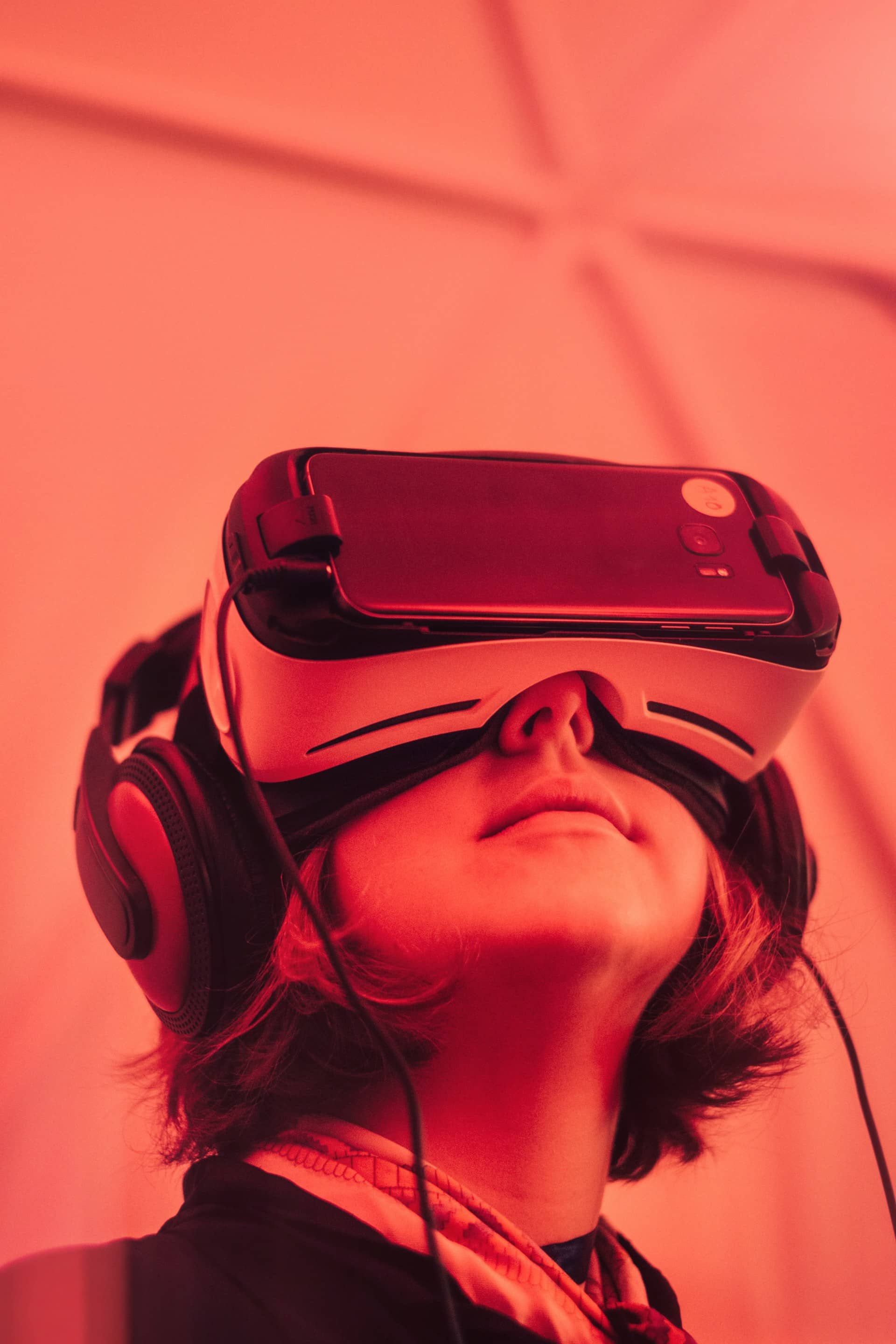 Person using a VR headset in a technology exhibit